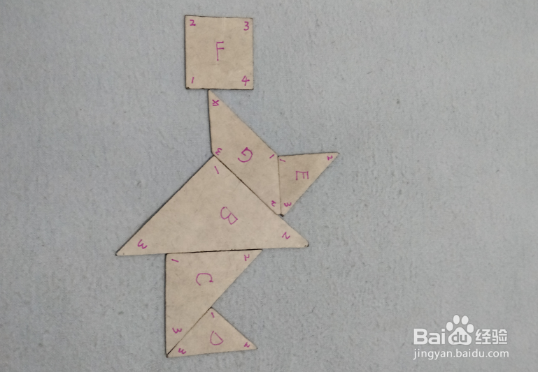 用七巧板怎样拼一个拿着伞的小女孩?