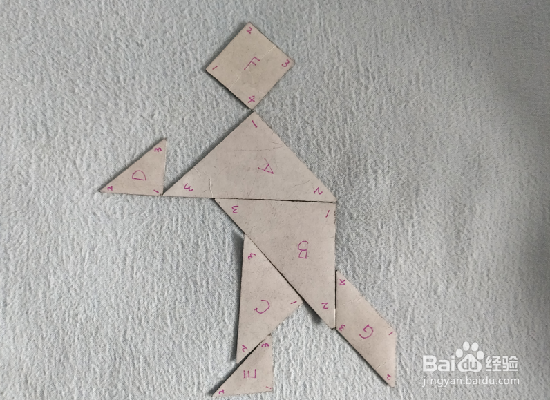 用七巧板怎样拼一个引火准备做饭的人？