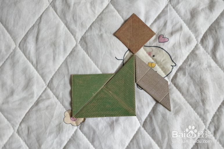 用九巧板怎么拼一个跳街舞的小哥哥呢？