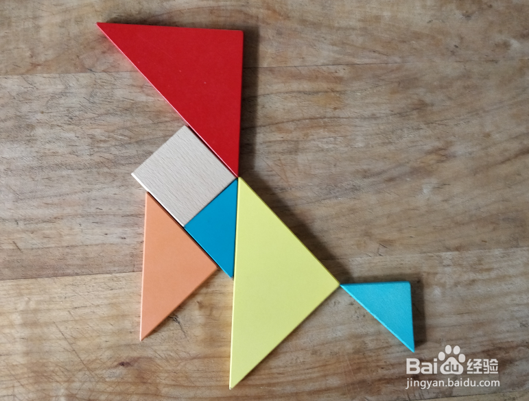 如何用七巧板拼一只抬头吃树叶的羊