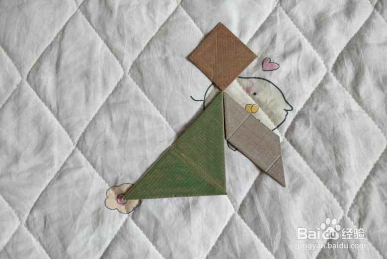 用九巧板怎么拼一个跳街舞的小哥哥呢？