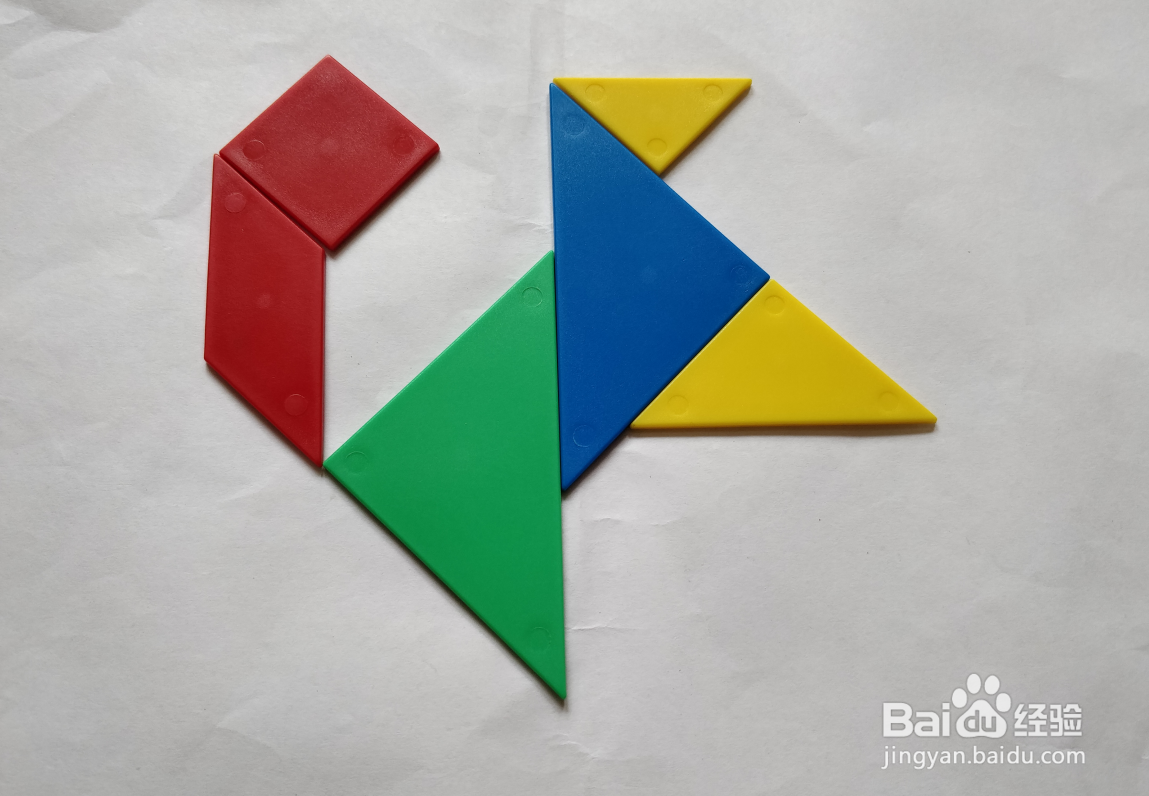 用(蝶式)七巧板怎么拼一只高兴跳跃的狗?