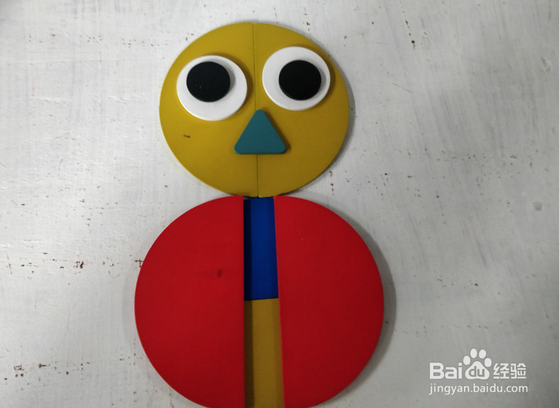 用智力拼板怎样拼一个不倒翁?