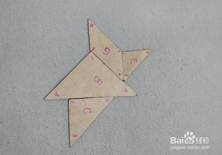 用七巧板怎样拼一个拿着伞的小女孩?