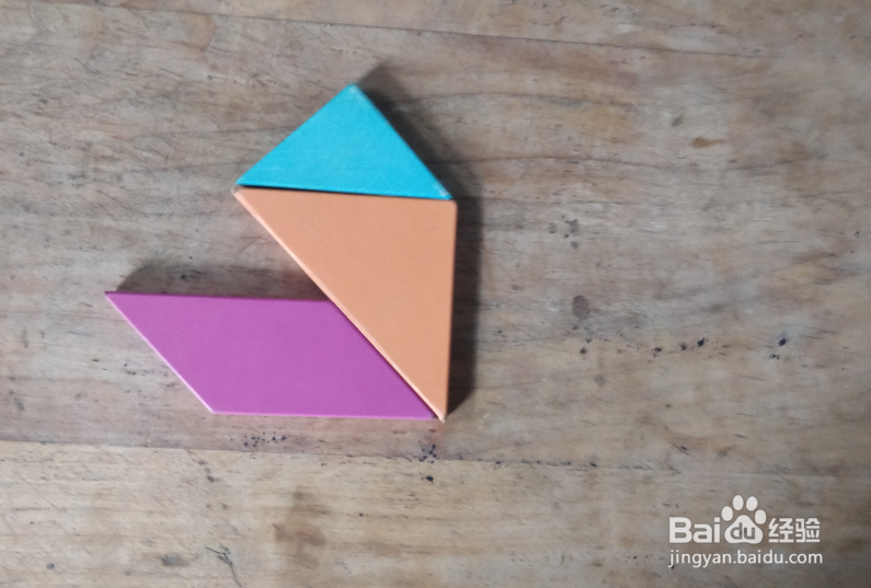 用七巧板怎样拼一个跪着擦地板的保洁员?