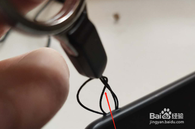 买手机壳送的挂绳怎么用