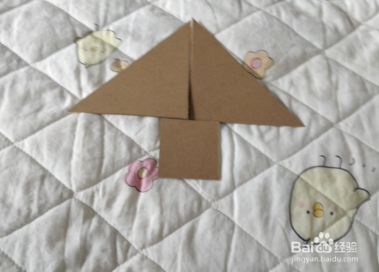 用七巧板怎么拼一只飞在空中的风筝呢？