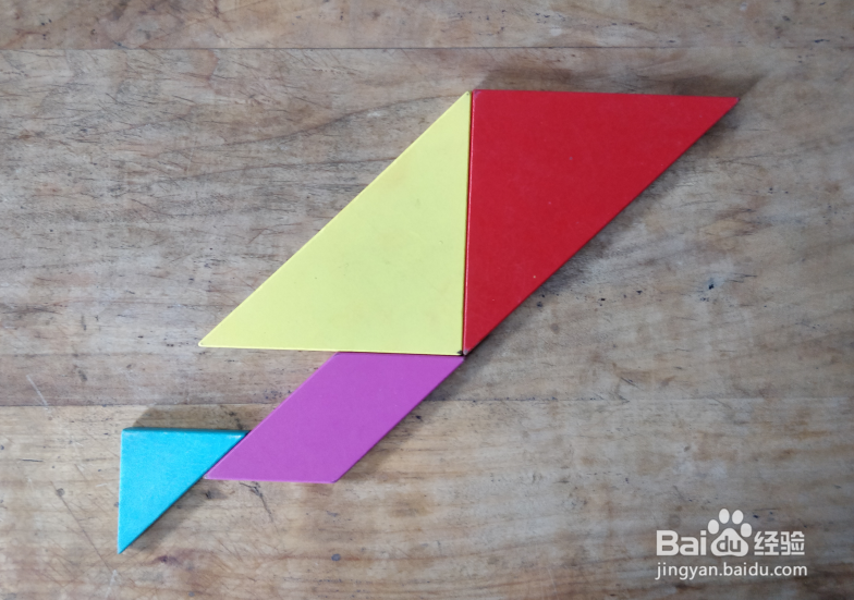 用七巧板怎样拼一个大步向前跑的人?