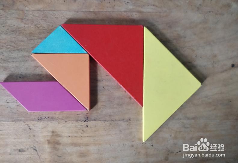 用七巧板怎样拼一个跪着擦地板的保洁员?