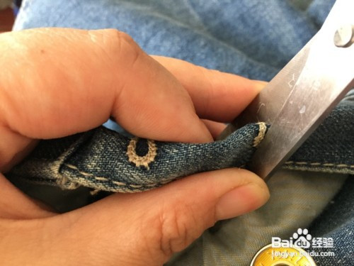 牛仔裤扣眼怎么剪