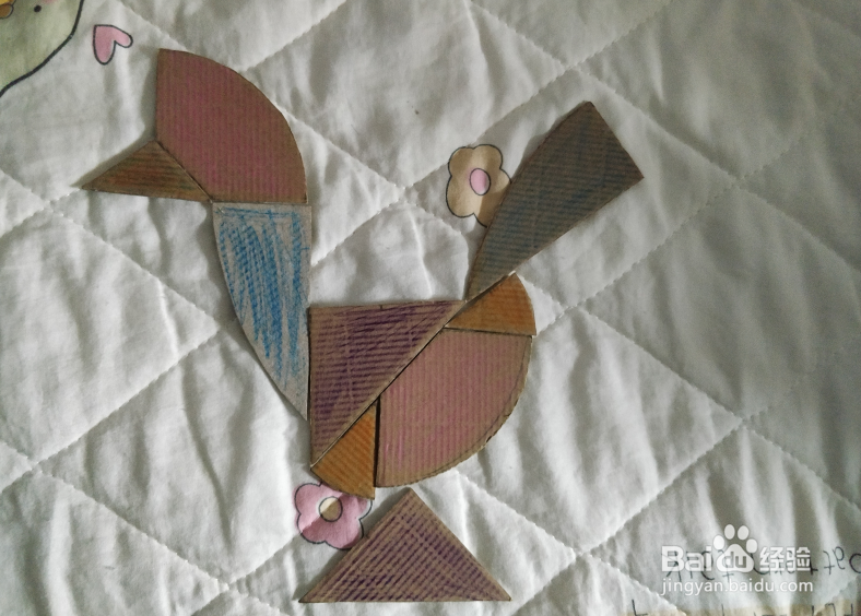 用蛋形九巧板怎么拼一只伸脖子站着的鸟儿