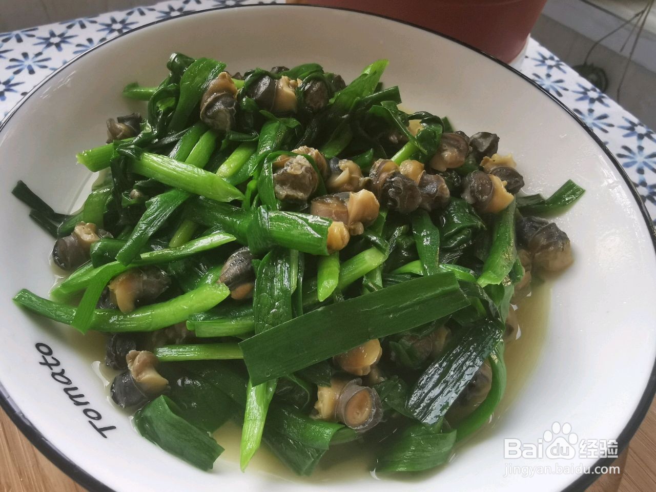 螺蛳头炒韭菜的做法