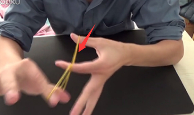魔术揭秘之橡皮筋穿越