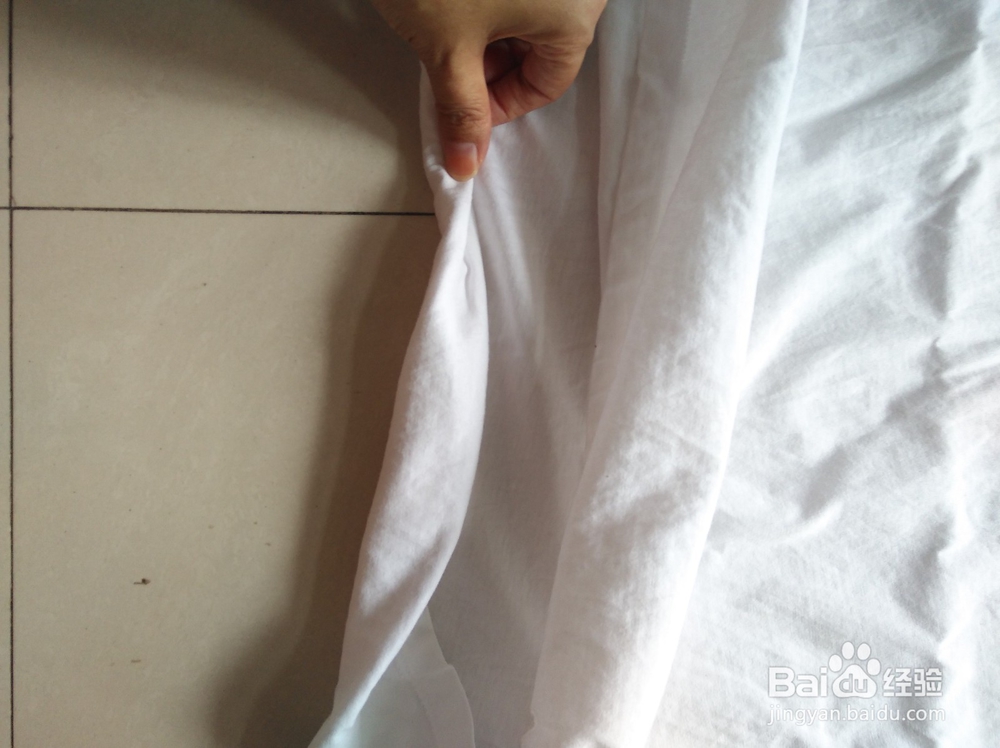 衣服怎么卷露肚脐