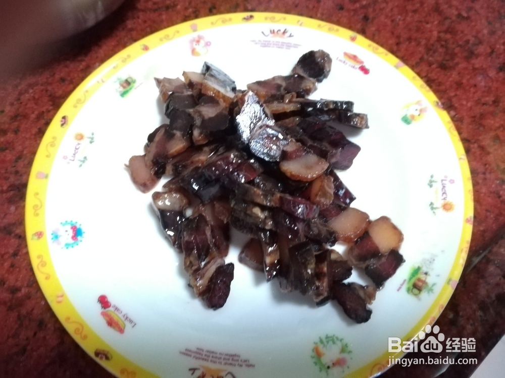 干煸腊肉菜花的做法