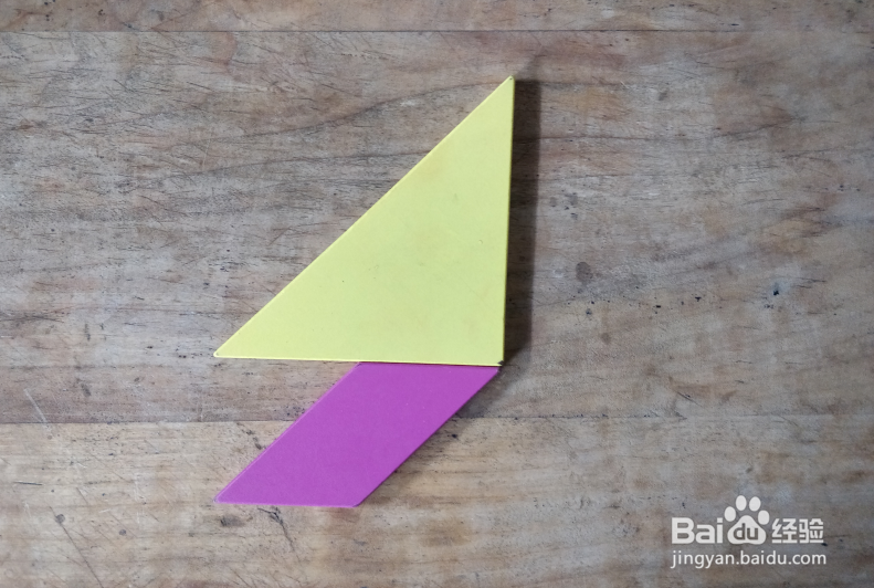 用七巧板怎样拼一个大步向前跑的人?