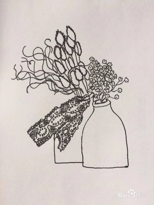 手工/爱好 > 书画/音乐 1 先在纸上用笔画出一个狗尾巴草和枝干,然后