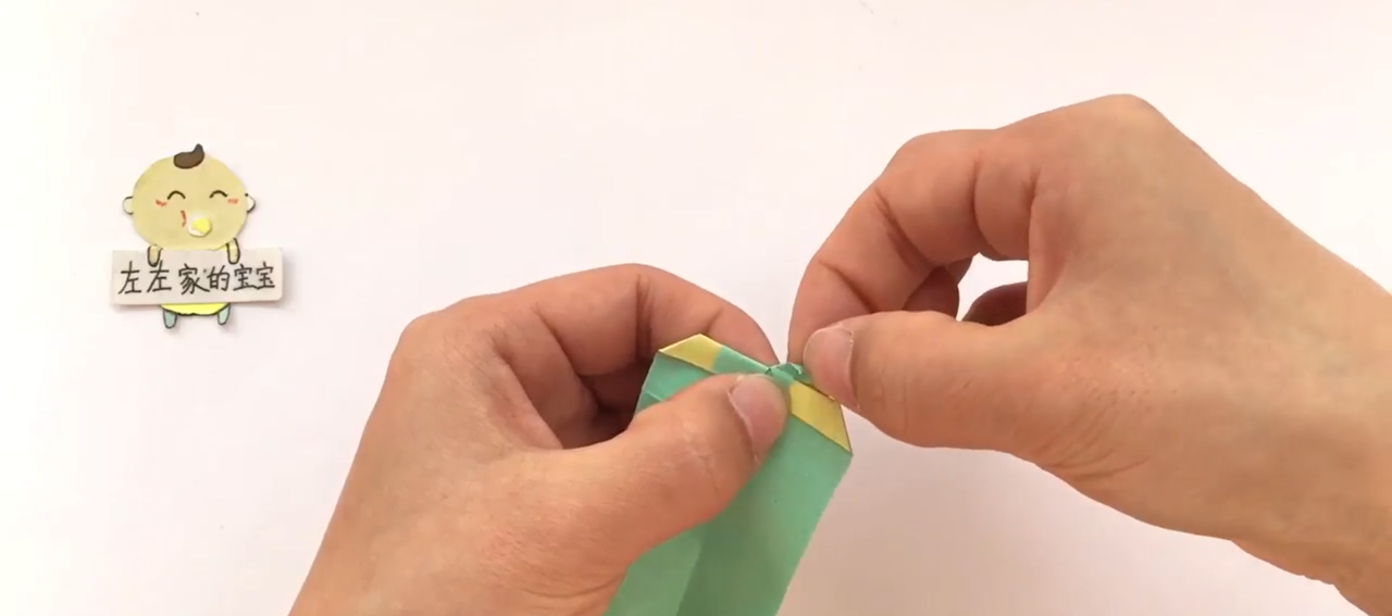 亲子折纸爱心卷纸扣怎么做