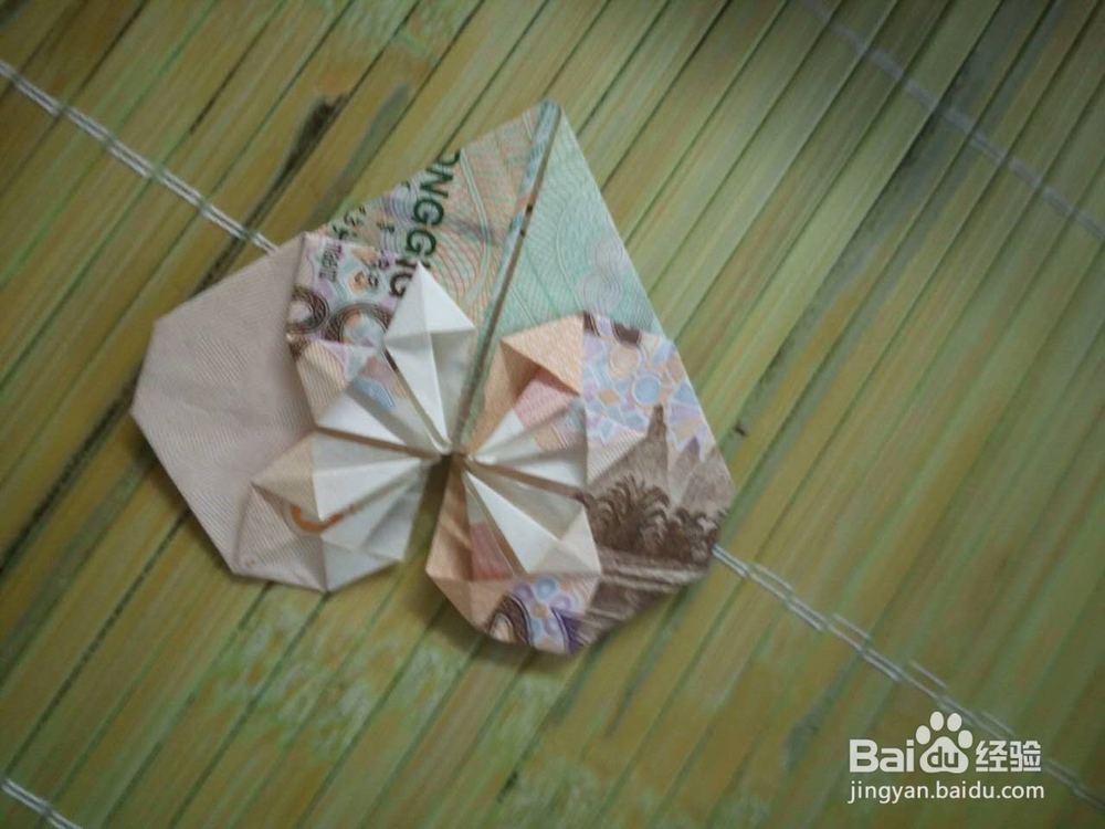如何用纸币折爱心