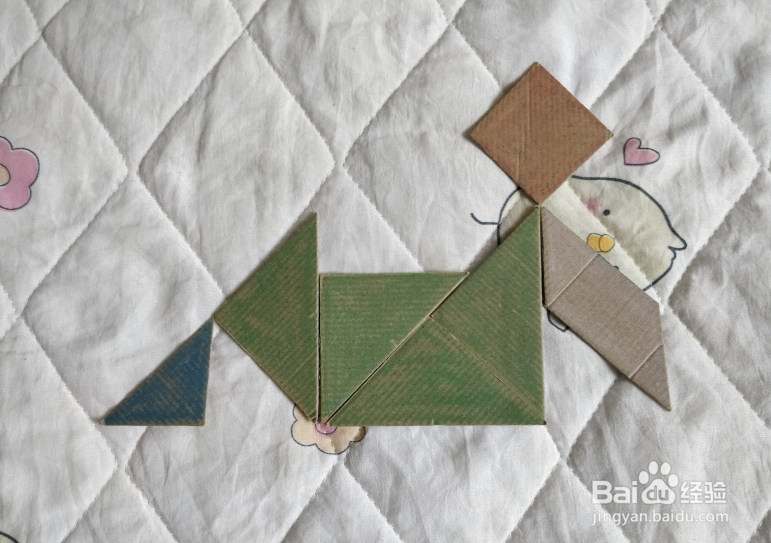 用九巧板怎么拼一个跳街舞的小哥哥呢？