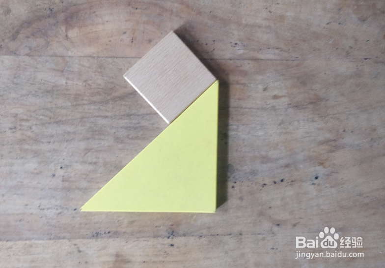 用七巧板怎样拼一只兴奋拍打鳍肢的企鹅?