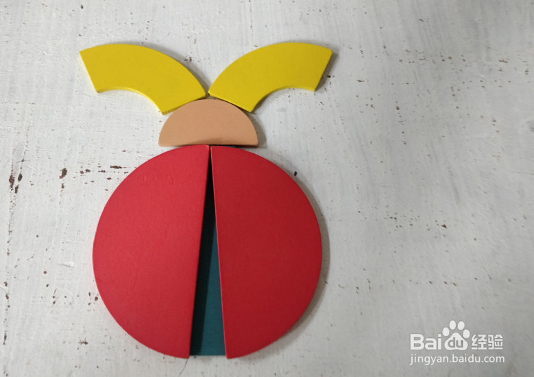 用智力拼板怎样拼一个金龟子?