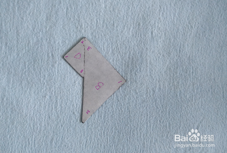 用七巧板怎样拼一只小狮子狗?