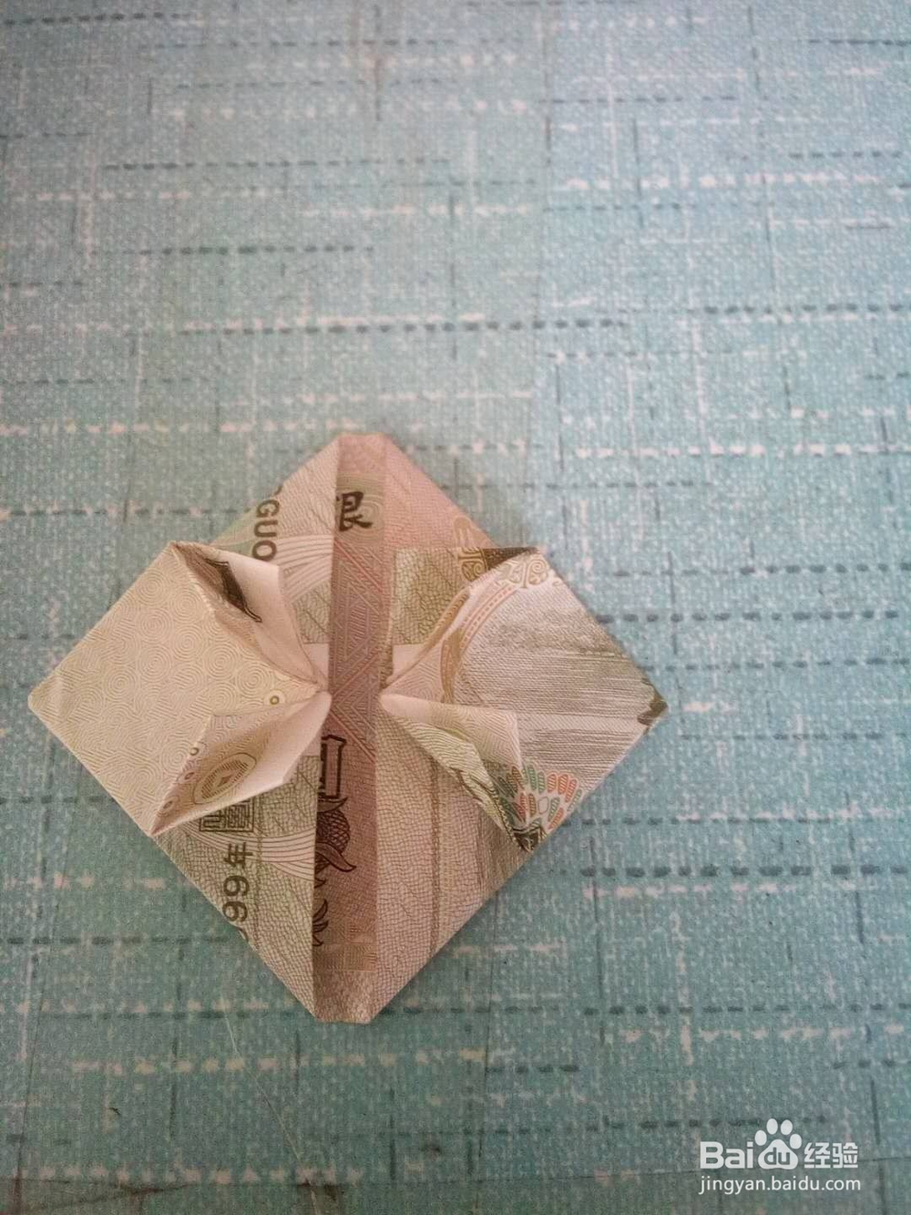 怎样用纸币折爱心