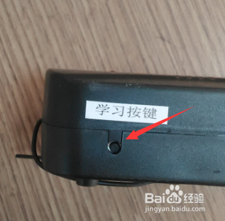 电动车库门管状电机控制器如何配遥控手柄