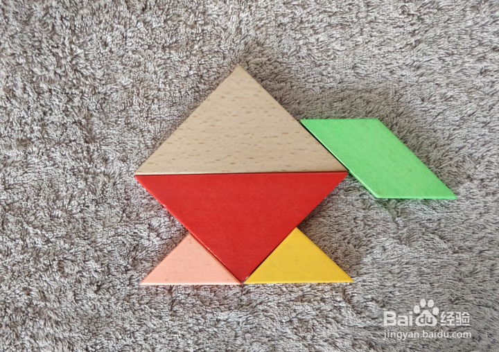 用七巧板怎么拼一把高端油壶呢?