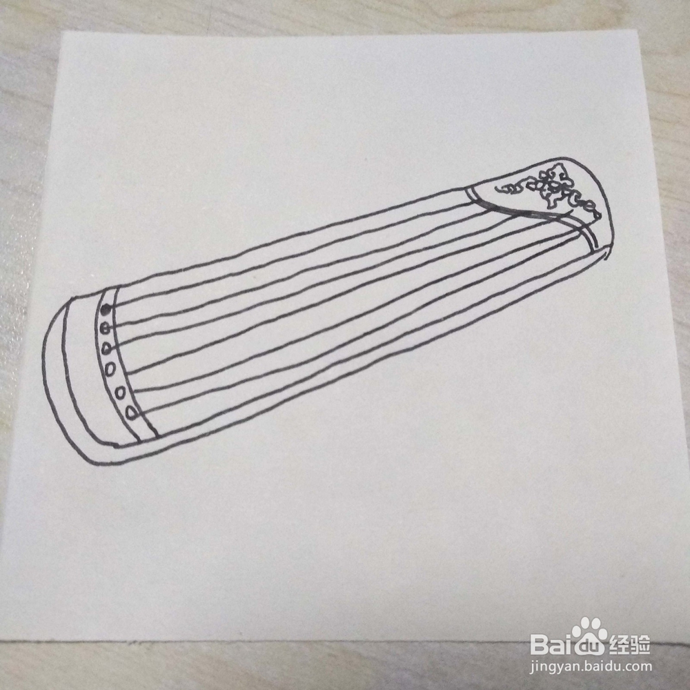 如何画一个古典风格的乐器古筝简笔画教程