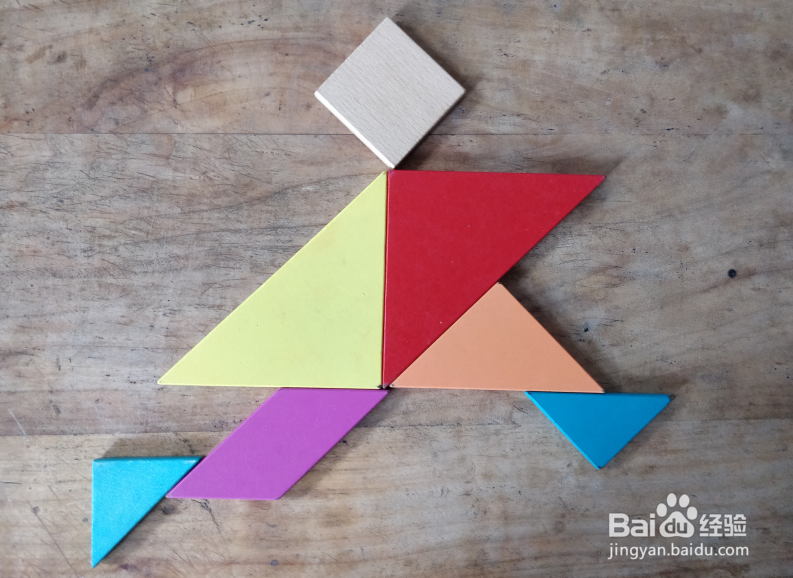 用七巧板怎样拼一个大步向前跑的人?