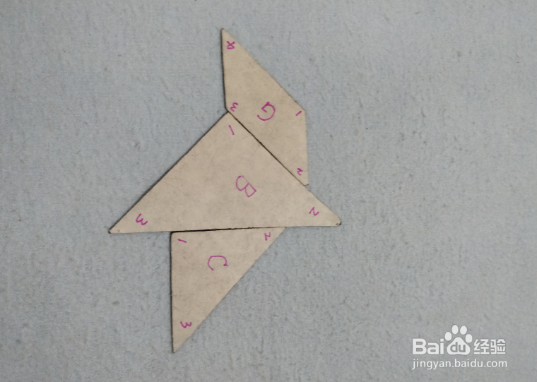 用七巧板怎样拼一个拿着伞的小女孩?