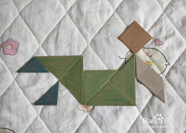 用九巧板怎么拼一个跳街舞的小哥哥呢？