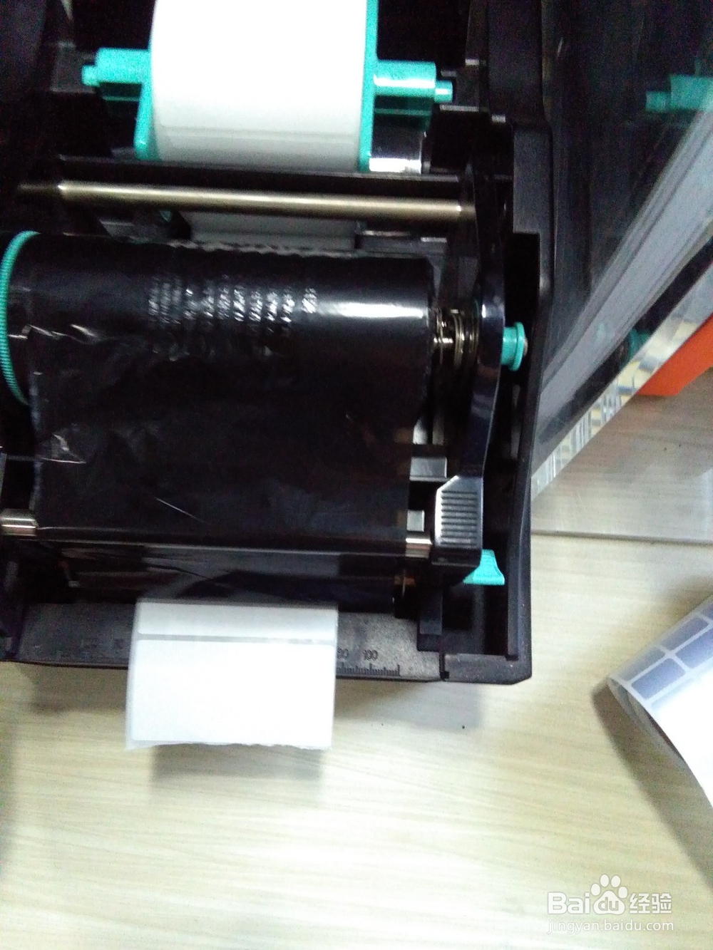 怎样安装博思得的打印机标签纸