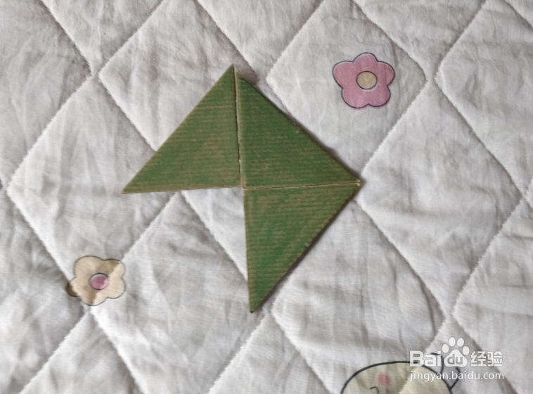 用九巧板怎么拼一个种子瓶呢