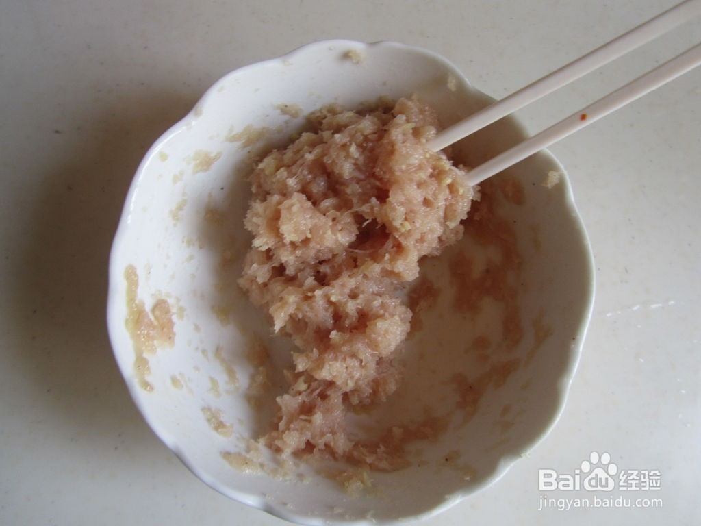 草菇焖鸡丸的做法