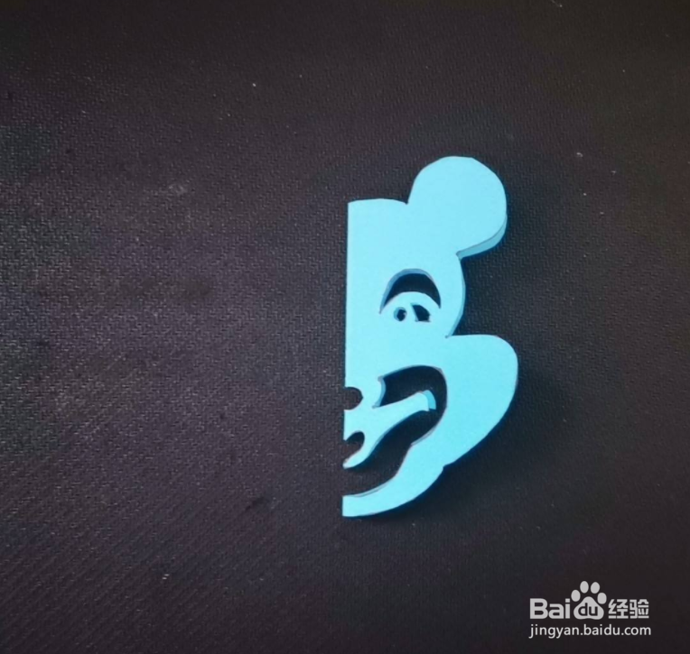 如何用彩色纸剪出米老鼠纹样