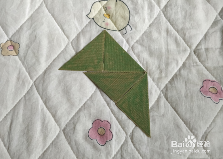 用九巧板怎么拼一个练习蒙古舞的小哥哥呢？