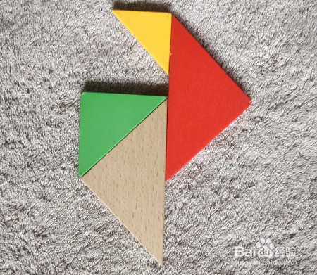 用七巧板怎样拼一个跳台上跳水的运动员呢?