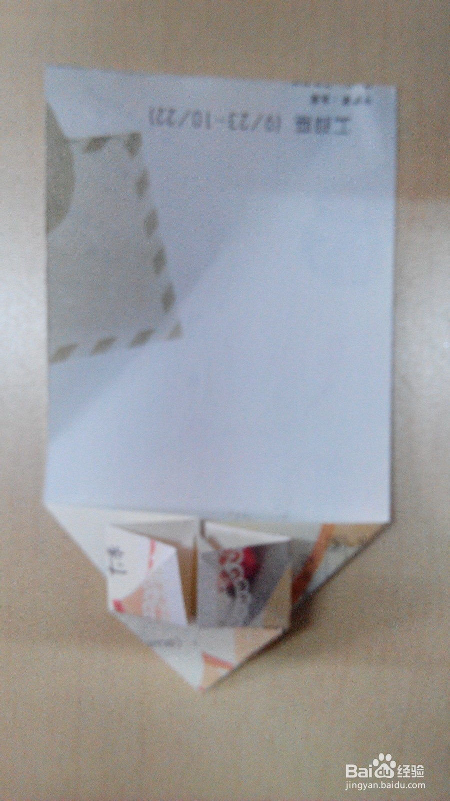 利用纸币或者折纸折一颗心的折法