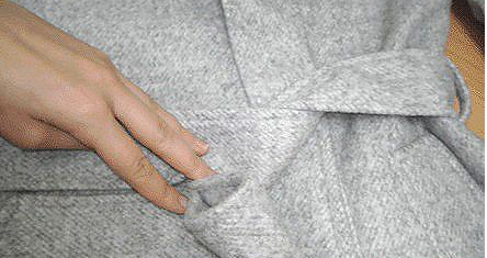 风衣腰带后系法