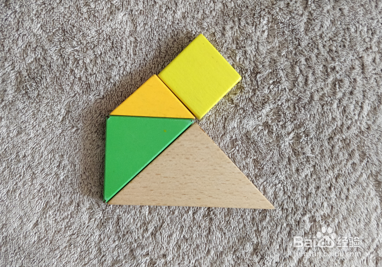 用七巧板怎样拼一个杏核？