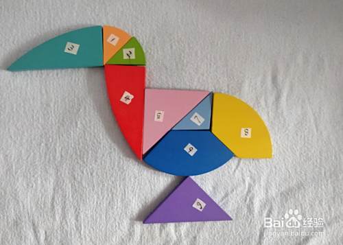 用蛋形九巧板怎么拼一只站着的水鸟?