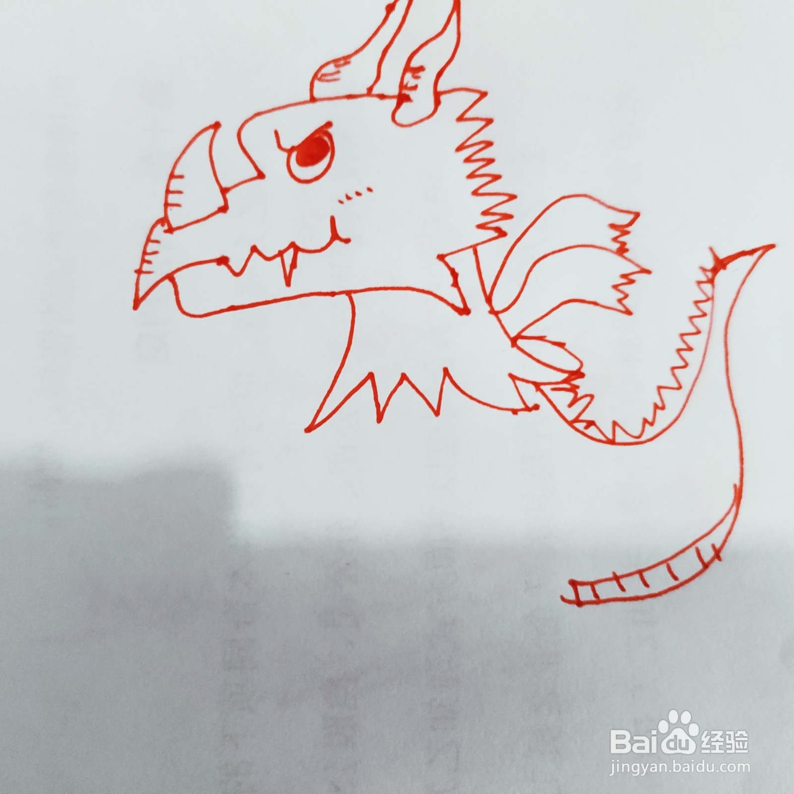 如何来画一只凶猛的大恐龙简笔画呢