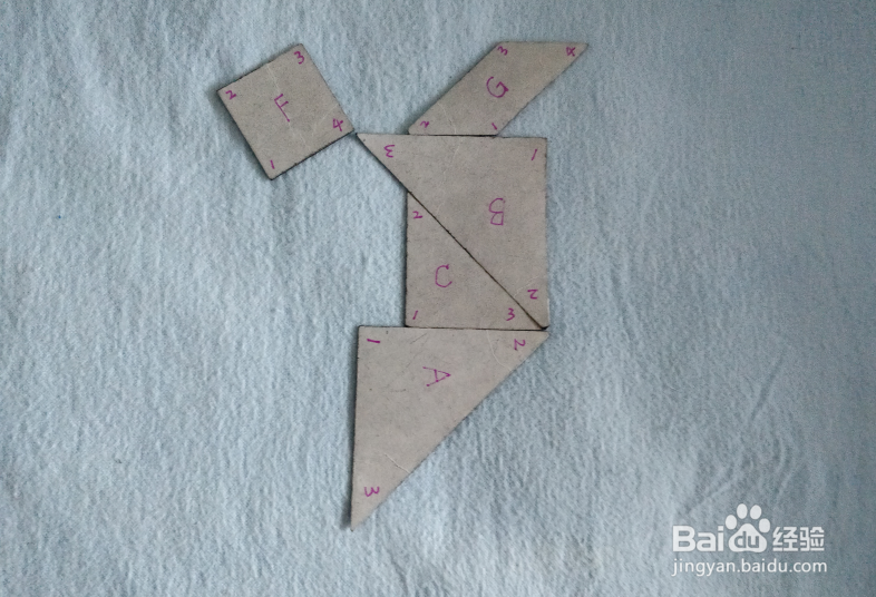 用七巧板怎样拼一个踮脚尖的舞者？