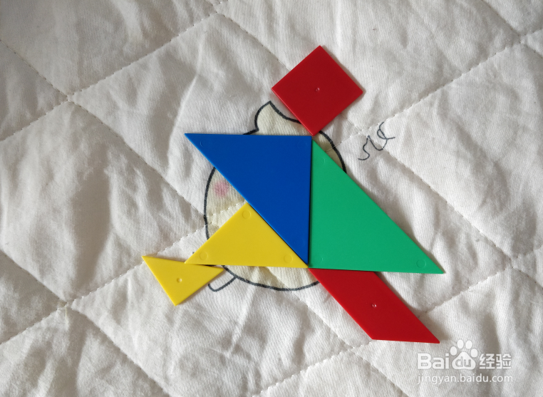 用七巧板智力拼图怎么拼一个赶忙跑出去的人？