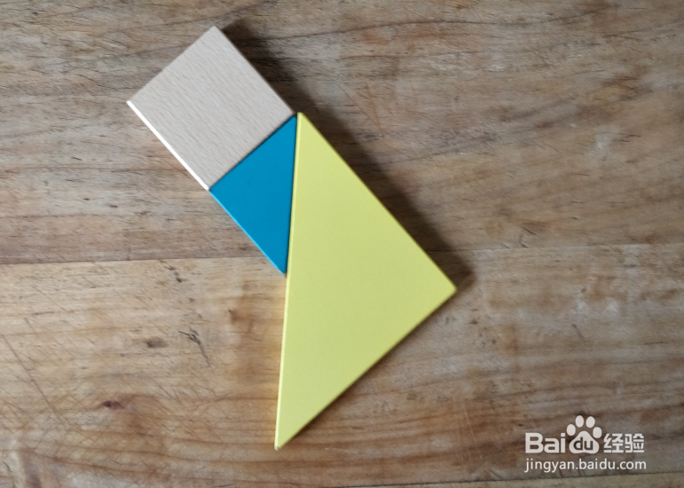 如何用七巧板拼一只抬头吃树叶的羊