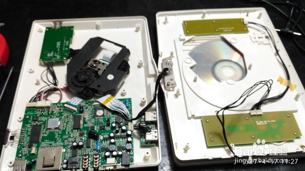 移动DVD机充不进电不开机音量失控故障维修经验