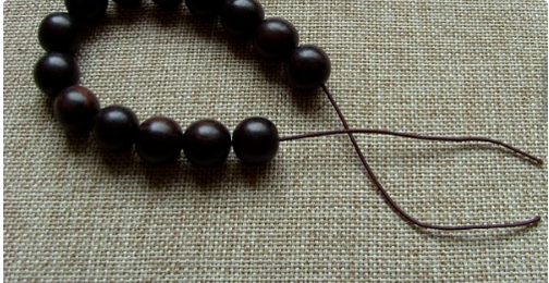 两条细线如何打结打的紧